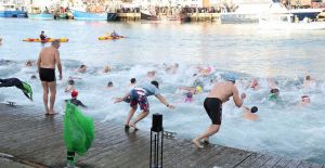 One of six groups to swim across